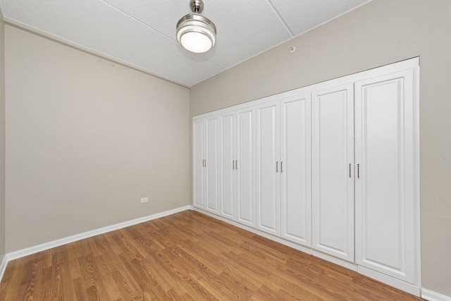 unfurnished bedroom with light hardwood / wood-style flooring