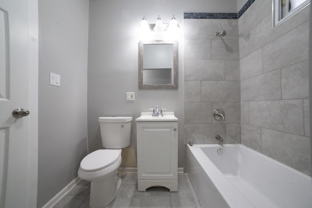 full bathroom featuring vanity, toilet, and tiled shower / bath