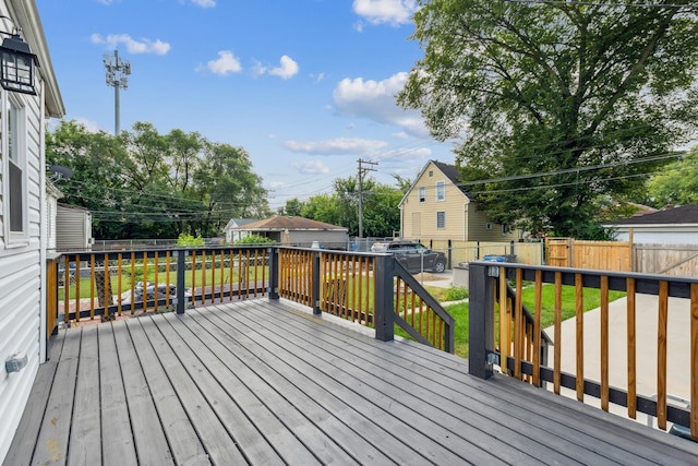 deck featuring a lawn