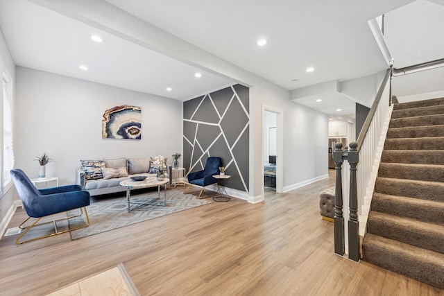 sitting room featuring light hardwood / wood-style floors