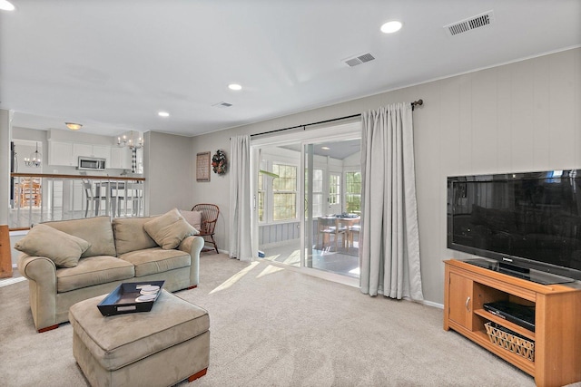 living room featuring light colored carpet