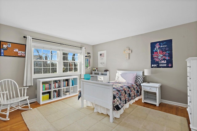 bedroom featuring wood-type flooring