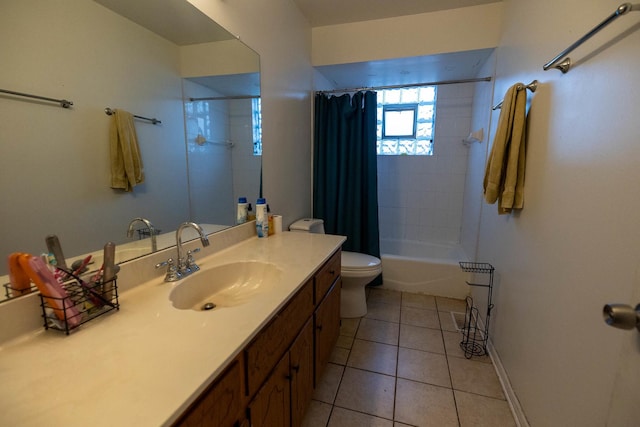 full bathroom with toilet, shower / bath combo, vanity, and tile patterned floors