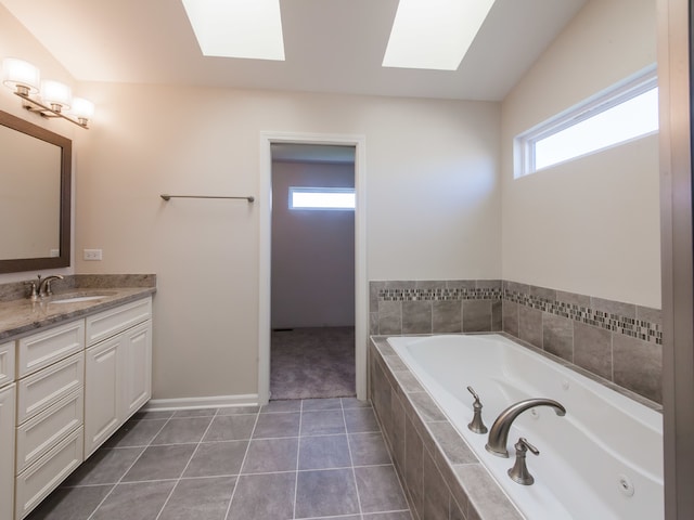20137 Preston Ln, Lynwood, IL 60411 - full bath with a skylight, vanity, a jetted tub, and tile patterned floors