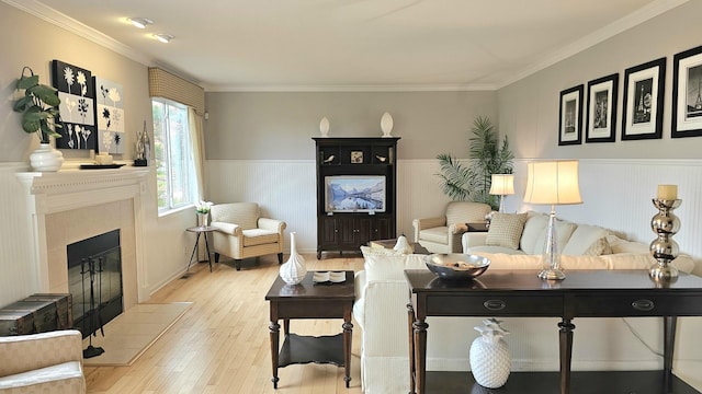 20137 Preston Ln, Lynwood, IL 60411 - living room with hardwood / wood-style floors, a wainscoted wall, a tile fireplace, and ornamental molding
