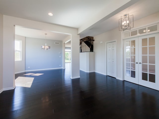 20137 Preston Ln, Lynwood, IL 60411 - empty room with a chandelier, wood finished floors, plenty of natural light, and recessed lighting