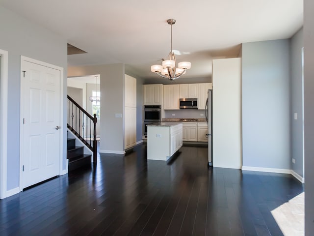 20137 Preston Ln, Lynwood, IL 60411 - kitchen featuring stainless steel appliances, a chandelier, a kitchen island, and dark wood-style floors