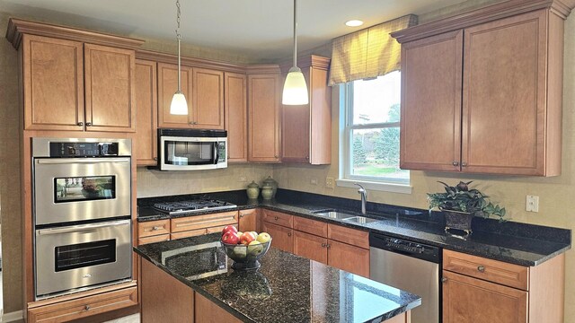20149 Preston Ln, Lynwood, IL 60411 - kitchen with appliances with stainless steel finishes, dark stone counters, hanging light fixtures, a kitchen island, and recessed lighting