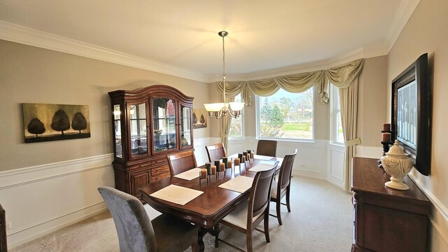 20149 Preston Ln, Lynwood, IL 60411 - dining room featuring a chandelier, ornamental molding, light carpet, a wainscoted wall, and a decorative wall