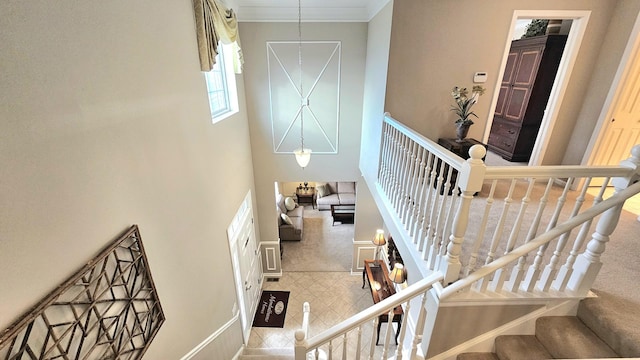 20149 Preston Ln, Lynwood, IL 60411 - stairway with a towering ceiling, crown molding, and carpet flooring