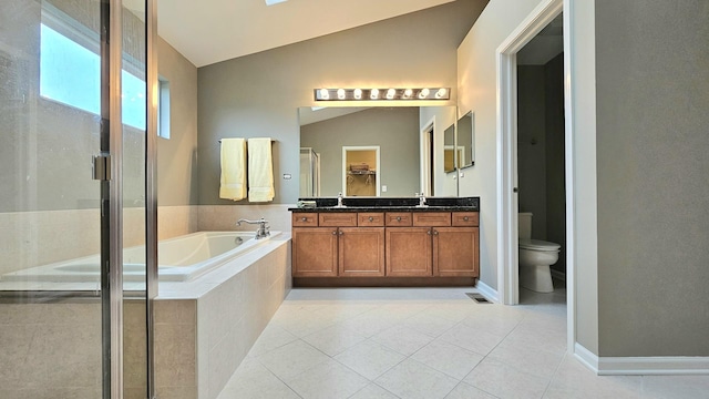 20149 Preston Ln, Lynwood, IL 60411 - bathroom featuring double vanity, a bath, a stall shower, tile patterned floors, and vaulted ceiling