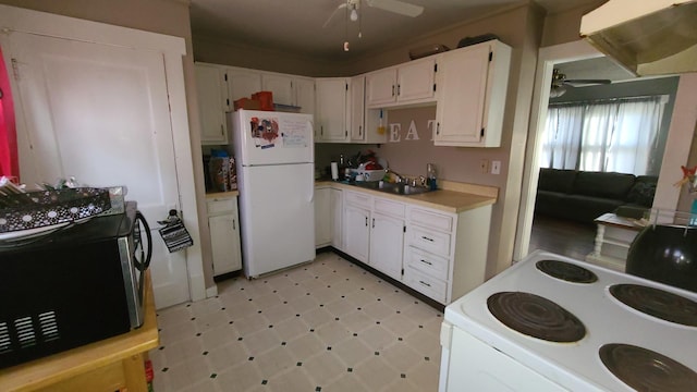 kitchen featuring ceiling fan, sink, white cabinets, and white appliances