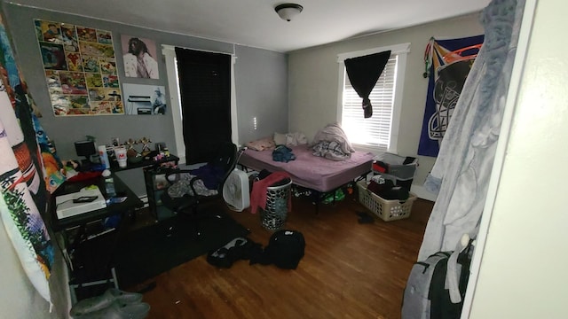 bedroom featuring hardwood / wood-style flooring