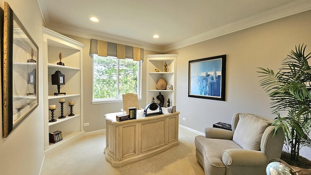 home office featuring built in shelves, crown molding, and light carpet