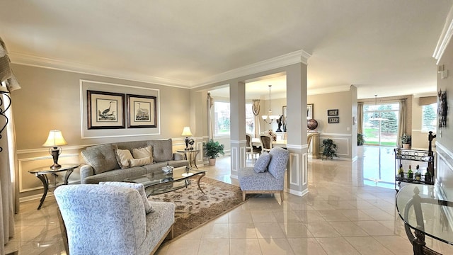 tiled living room with an inviting chandelier and crown molding