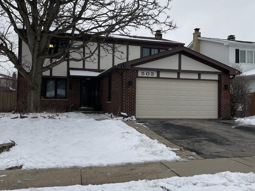 view of front of home with a garage