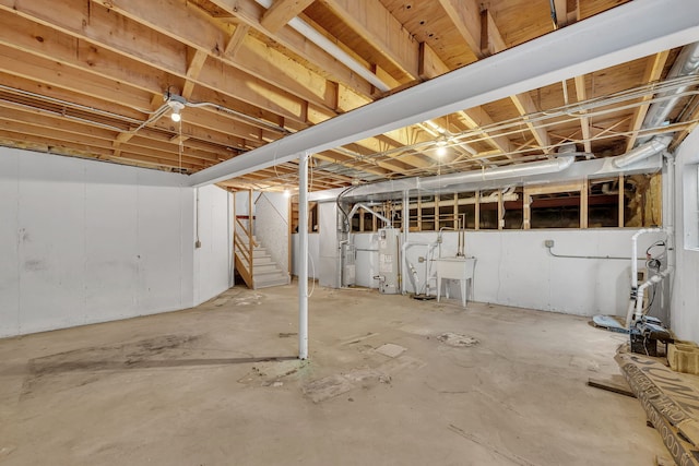 basement featuring water heater