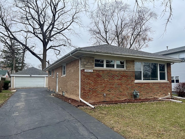 view of property exterior with a yard, an outbuilding, and a garage