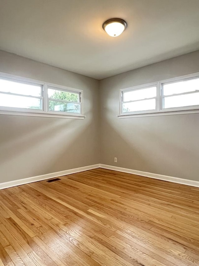 empty room with light wood-type flooring