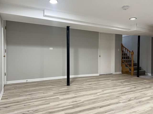 basement featuring light hardwood / wood-style floors