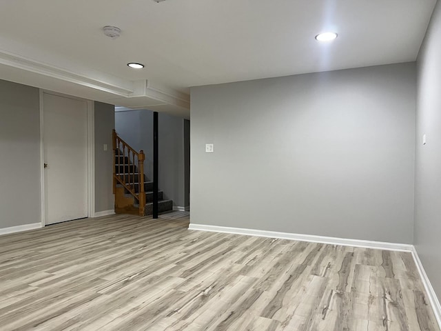 basement featuring light hardwood / wood-style floors