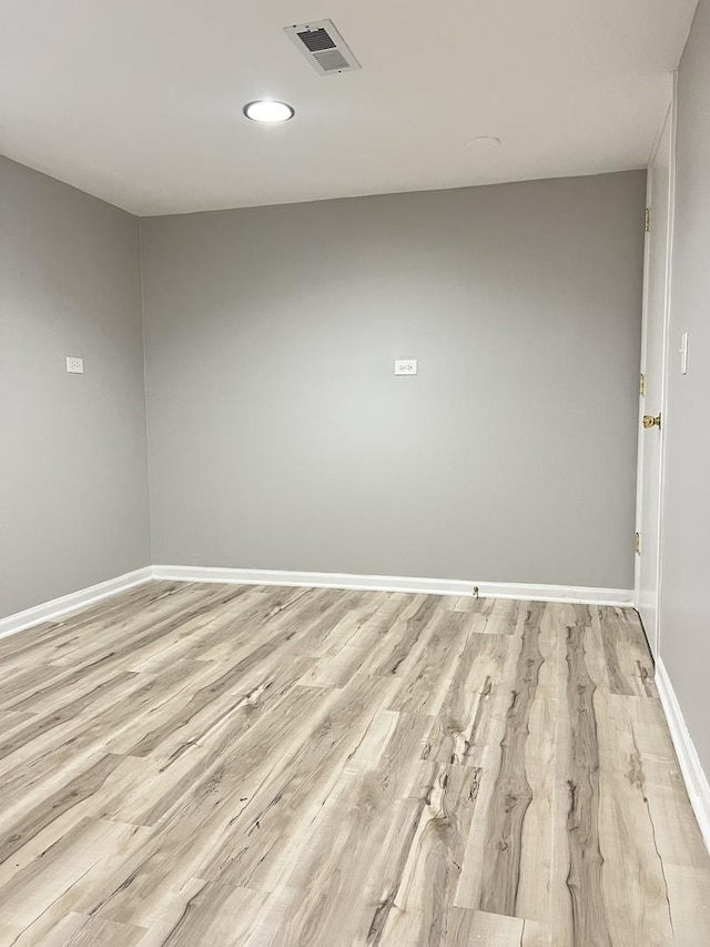 unfurnished room featuring light wood-type flooring