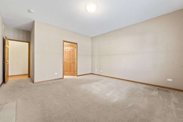 unfurnished bedroom featuring light colored carpet