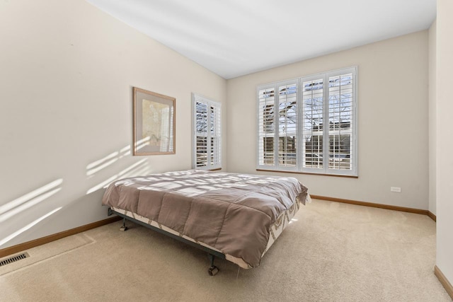 bedroom featuring carpet