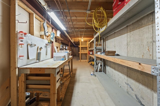 basement with a workshop area