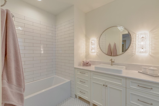 bathroom with tile patterned floors and vanity