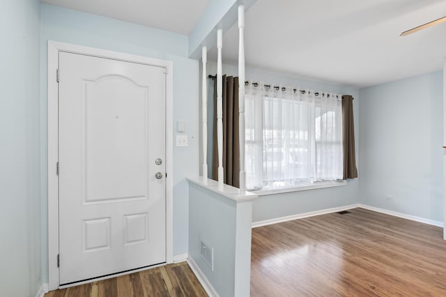 entrance foyer featuring ceiling fan and hardwood / wood-style floors