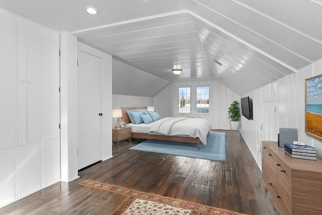 bedroom with dark wood-type flooring and vaulted ceiling