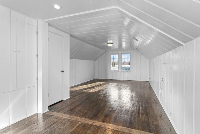 bonus room with lofted ceiling and wood-type flooring