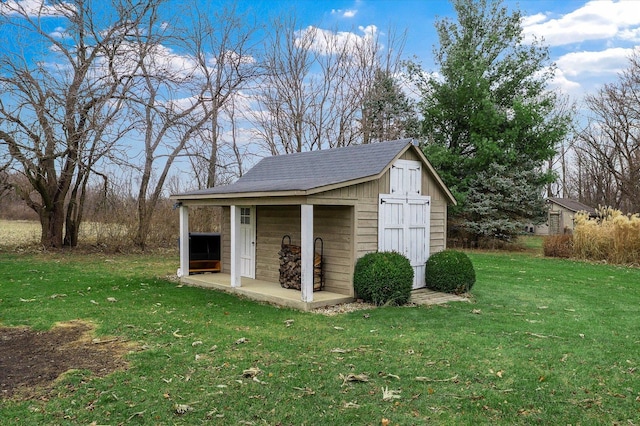 view of outbuilding featuring an outdoor structure