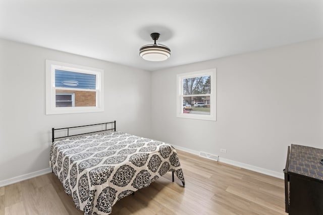 bedroom featuring light hardwood / wood-style floors