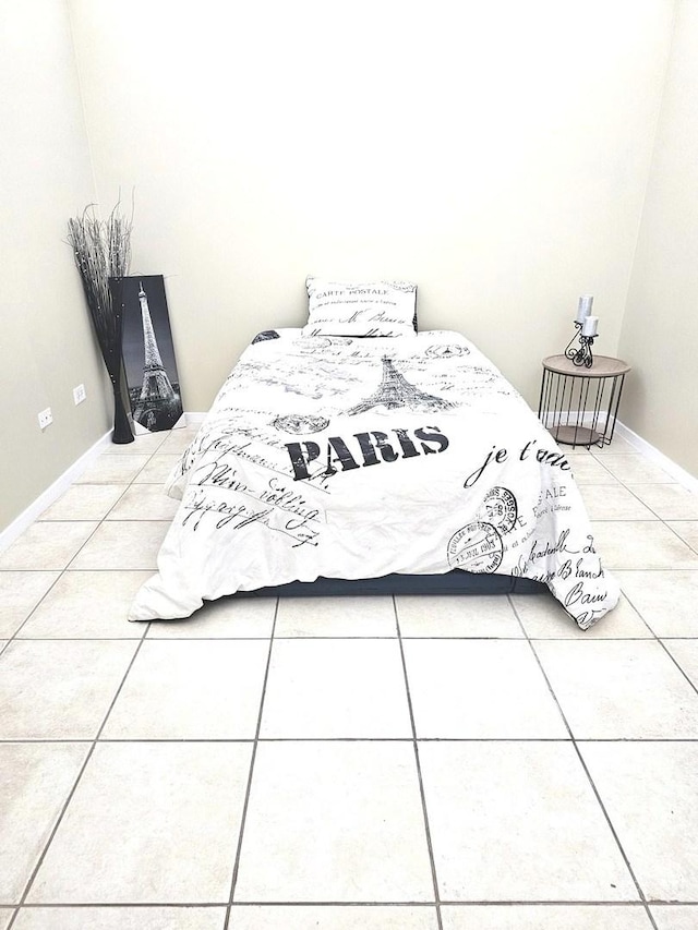 bedroom with tile patterned flooring