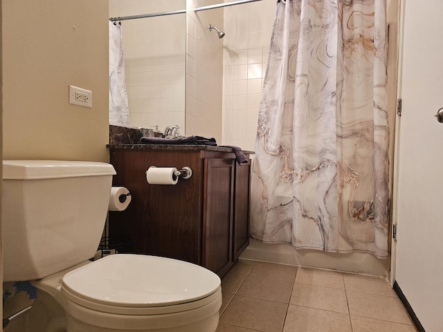 bathroom with tile patterned floors, shower / tub combo, and toilet