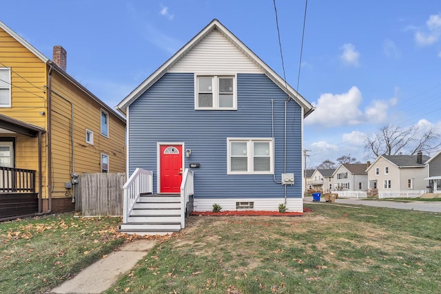 view of front of home with a front lawn