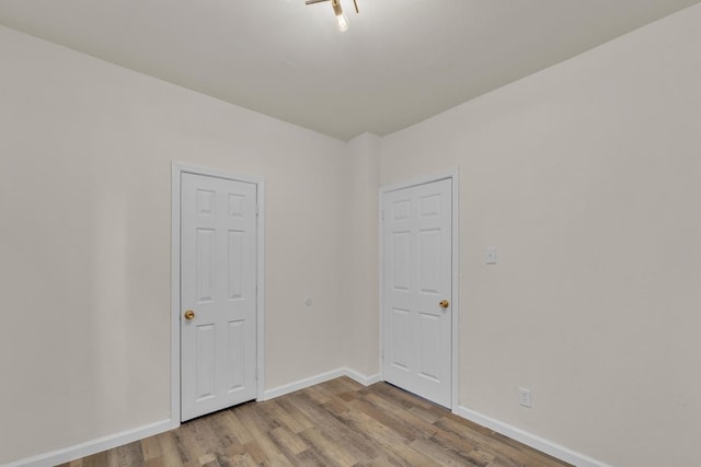 unfurnished room featuring light wood-type flooring