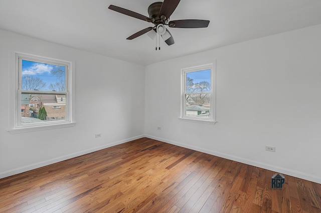 unfurnished room featuring wood-type flooring and ceiling fan