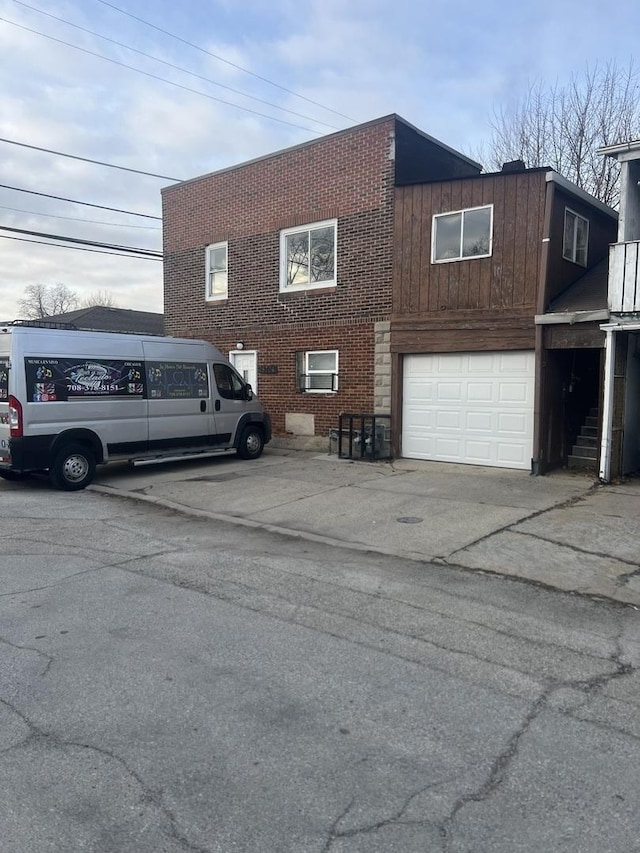 exterior space with a garage