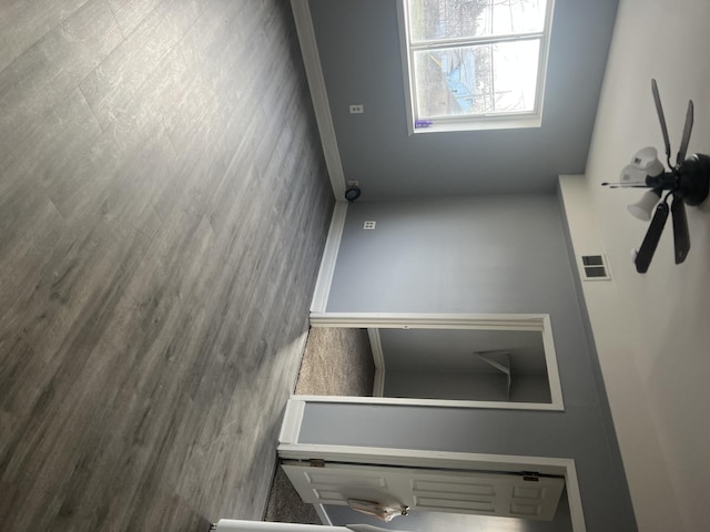 spare room with hardwood / wood-style flooring