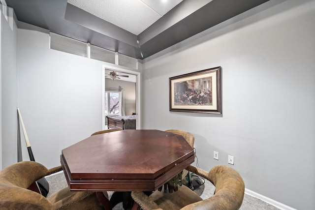 dining area with ceiling fan