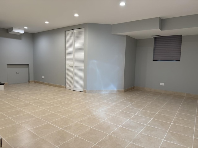 basement with light tile patterned floors