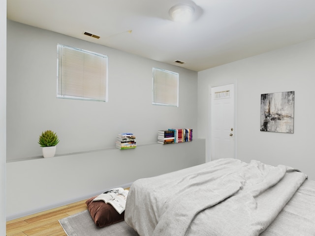 bedroom featuring wood-type flooring