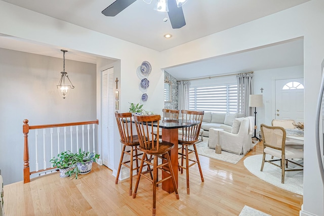 dining area featuring recessed lighting, ceiling fan, and wood finished floors