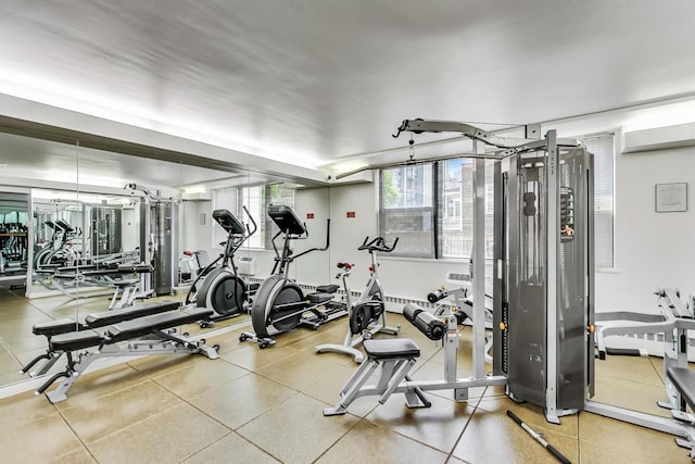 gym with a wall mounted air conditioner