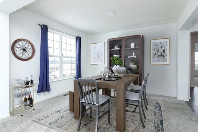 view of carpeted dining space