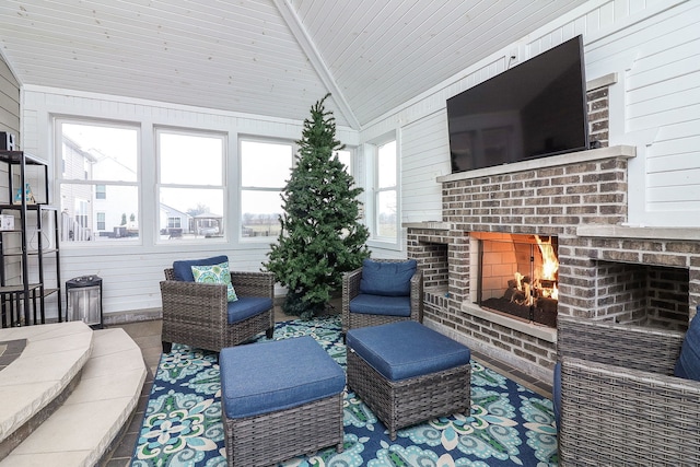 interior space with an outdoor brick fireplace