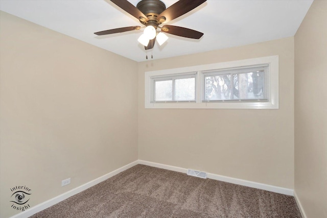 empty room featuring carpet flooring and ceiling fan